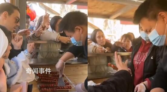 中國人在西班牙賣糖葫蘆1串30元 糖葫蘆酸甜口味符合當地人的口味