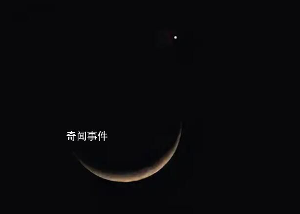 40秒看天宇上演“星月神話” 一輪彎彎的月牙和金星相依在天空中