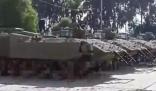 疑哈馬斯占領(lǐng)以軍事基地畫面曝光 繳獲裝甲車與坦克的畫面